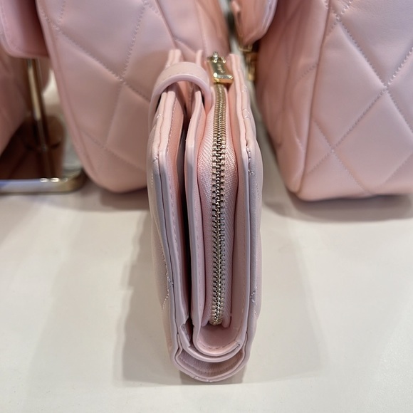 Kate Spade Carey Medium Compartment Bifold Wallet
COLOR: Conch Pink - Picture 16 of 16